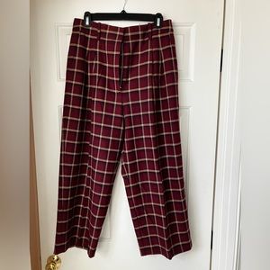 Wilfred Effortless pants in red plaid with black/cream accent. Poly/wool blend.